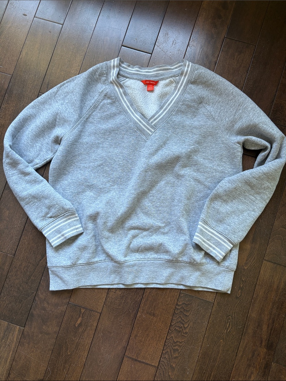 Gray V-Neck women’s Sweatshirt size large fits like a medium